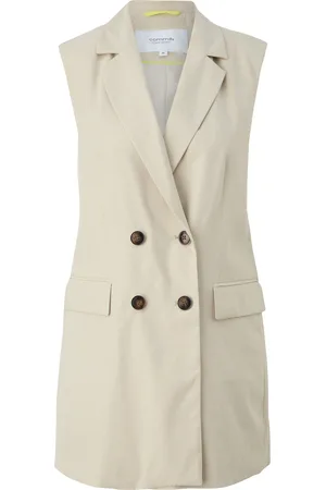 Comma, Vest