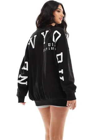 Missyempire Sweatshirt med New York-slogan på ryggen