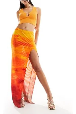 Farai London Carina - Maxinederdel med lårslids og knapper i mesh med orange ombreprint