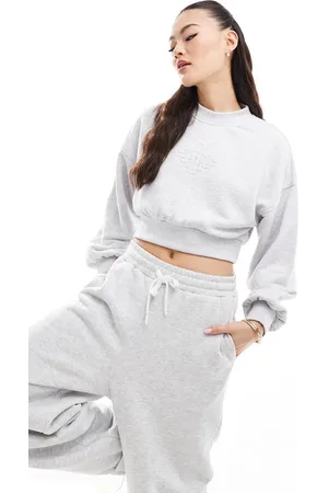 The Couture Club Cropped sweatshirt med emblem i gråmeleret