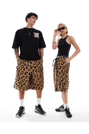 COLLUSION Unisex - Longline-shorts med leopardprint-Blå