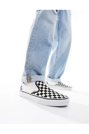 Vans Slip-on-sneakers i sorte og hvide skaktern