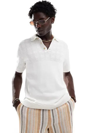 Abercrombie & Fitch Strikket og cropped hvid poloskjorte med mønster
