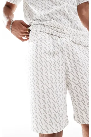 Armani Exchange Jerseyshorts med gennemgående logoprint i hvid - Del af sæt