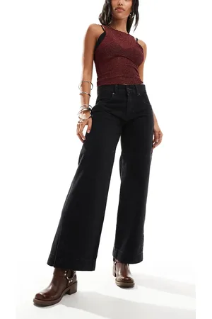 Free People Benjo - Sorte jeans med vide ben i afslappet pasform