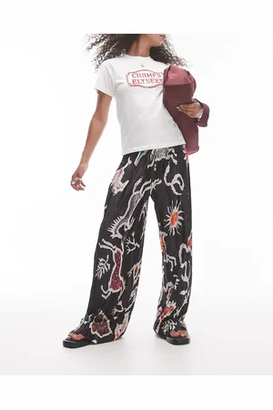 Topshop Plisserede bukser med brede ben og abstrakt cowgirl-print