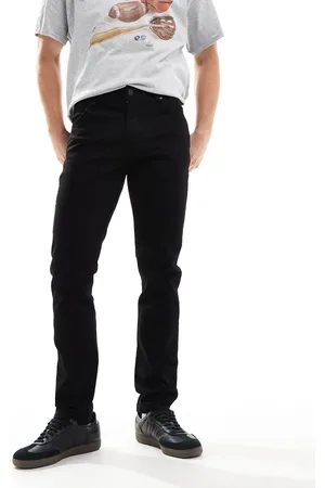Wrangler Larston - Smalle jeans i tapered fit med sort vask