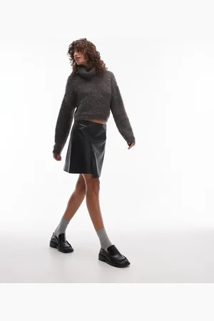 Topshop Mininederdel med asymmetrisk kant i imiteret læder