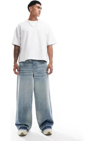 ASOS Lyseblå og super baggy jeans med tonet vintagevask frynser i kanten