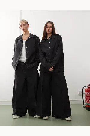 Reclaimed Unisex - Sorte bukser i nylon med kontrastfarvede stikninger