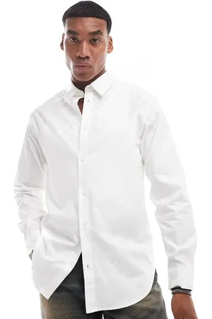 Armani Exchange Skinnende satinskjorte med lange ærmer og gennemgående logoprint