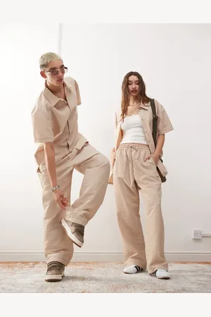 Reclaimed Unisex - baggy buks med kontrastfarvede stikninger-Neutral