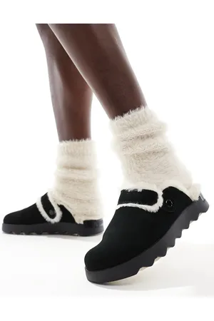 sorel Viibe Cozy - Sorte og neutrale clogs i ruskind med imiteret pels