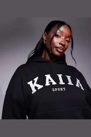 Kaiia Plus - og oversized hættetrøje med logo