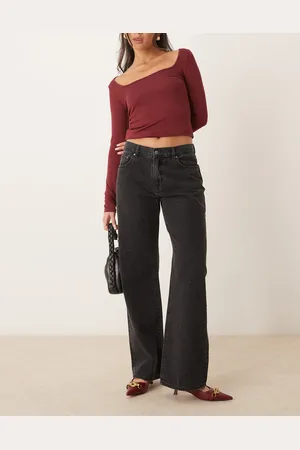Gina Tricot Vasket sorte jeans med lav talje, vide ben og krystaludsmykning