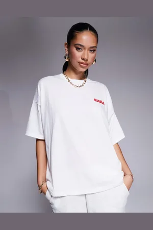Kaiia Studio - Oversized og hvid T-shirt med rødt boblelogo på ryggen