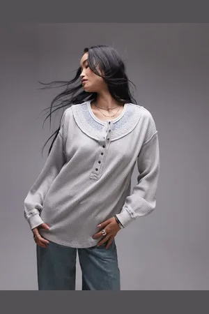 Free People Gråmeleret henley-sweatshirt med afslappet pasform og syede detaljer i vaffelstof