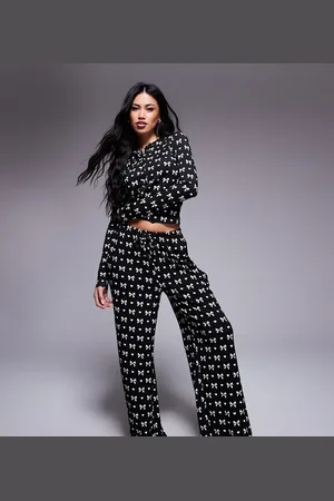Kaiia Sorte og hvide pyjamasbukser med sløjfeprint - Del af sæt - Kun hos ASOS-Multifarvet