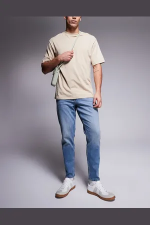 ASOS Blå tapered jeans med stretch og vintage-farveskær