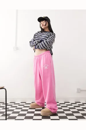COLLUSION Pink og ekstremt afslappede joggingbukser med logo