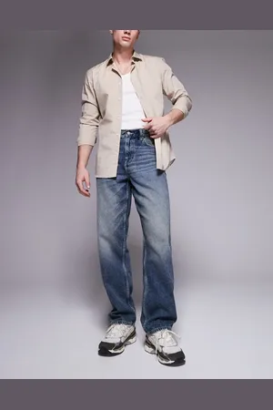 ASOS Mellemblå og forvaskede jeans i baggy fit med skær af farve i vintagestil