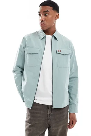 Fred Perry Lyseblå teknisk overskjorte med gennemgående lynlås