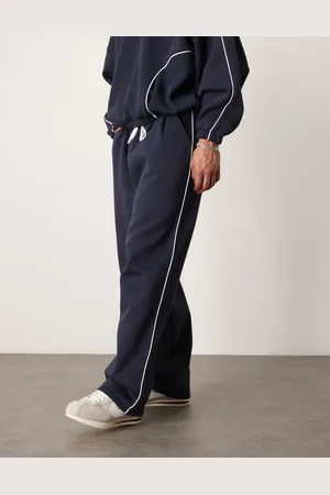 ASOS Marineblå superløstsiddende joggingbukser med kontrasterende kant i siden - Del af sæt