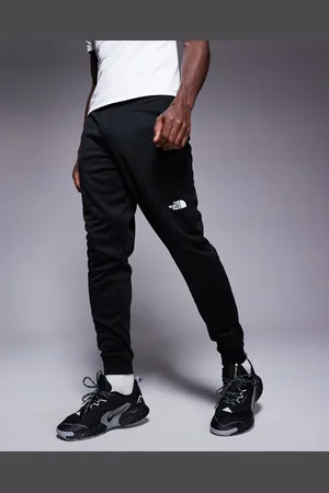 The North Face Reaxion - Sorte joggingbukser med logo