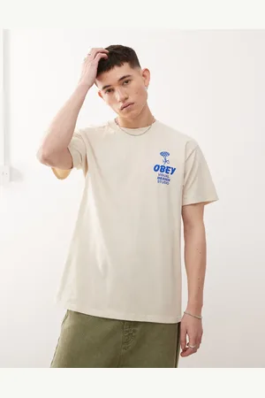 Obey Building Strong Minds - Cremehvid T-shirt med grafisk logoprint