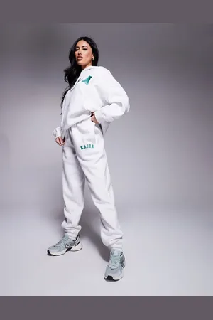 Kaiia Sport - Gråmelerede joggingbukser med tætsiddende buksekanter og broderet logo - Del af sæt