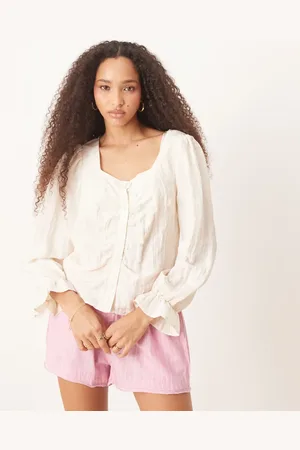 AWARE Cremehvid bluse med blouson-ærmer i krølstof
