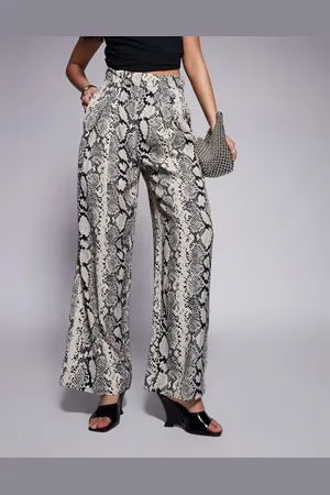 River Island Cremehvide bukser med svaj og slangeprint