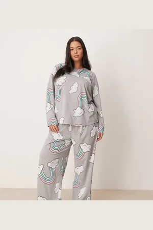 ASOS ASOS DESIGN Curve - pyjamassæt med langærmet top og bukser med regnbueprint