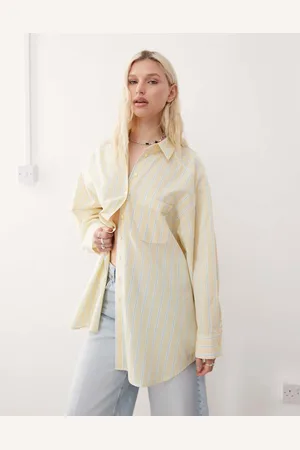 COLLUSION Oversized lysegul poplin-skjorte med striber