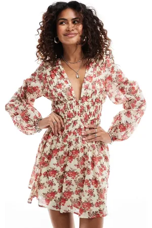 Free People Minikjole med V-hals og blomstermønster i boho-stil-Lyserød