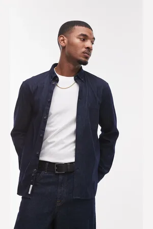 ARKET Mørkeblå og forvasket skjorte i denimchambray med button down-krave