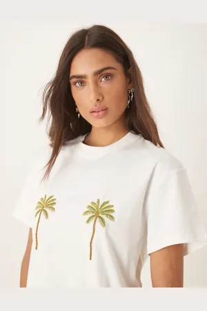 Never Fully Dressed T-shirt med broderede palmer over brysterne
