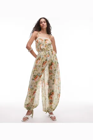 MANGO Lysegult jumpsuit med blouson-bukser og blomstermønster