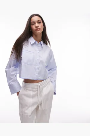 MANGO Cropped og lyseblå skjorte med striber
