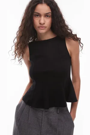 MANGO Strikket struktureret top med peplum-kant