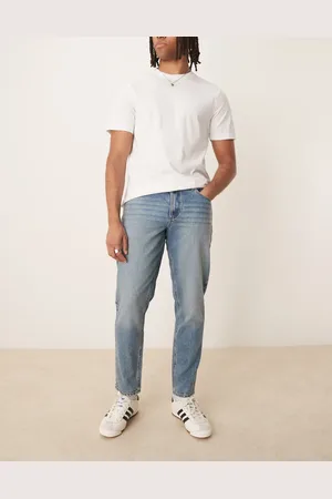 ASOS Tapered fit-jeans i medium forvasket blå fra