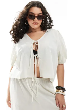 Esmée Esmée Curve - Lys beige strandtop med pufærmer og bindebånd foran - Kun hos ASOS-Neutral