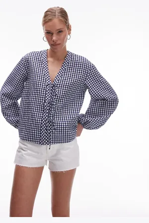ARKET Blå bluse med V-hals, sløjfer foran og gingham-tern