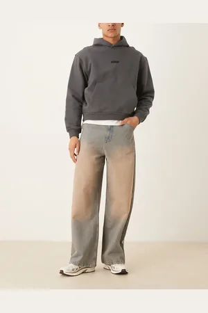 ASOS Superposede jeans i blå mellemvask med kraftigt rødt farveskær