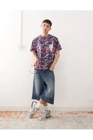 COLLUSION Lilla skater-T-shirt med camouflage-print i firkantet pasform