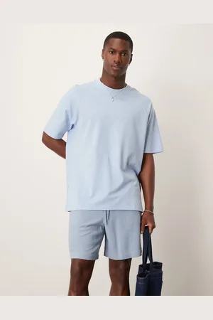 MANGO Lyseblå og afslappet T-shirt i hørblanding