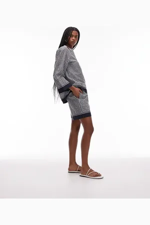 ARKET Strandshorts med pull-on-talje og blåt abstrakt teglprint i løstsiddende pasform