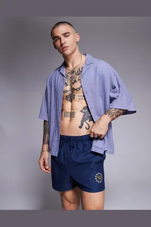 ASOS Korte badeshorts med gennemgående print i