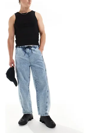 ASOS Mellemvasket blå oversized jeans med elastik i taljen og 