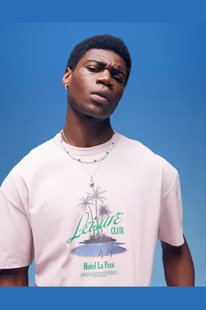 ASOS Vasket lyserød oversized T-shirt med palmeprint på brystet i kraftigt stof på 220 gsm i firkantet pasform